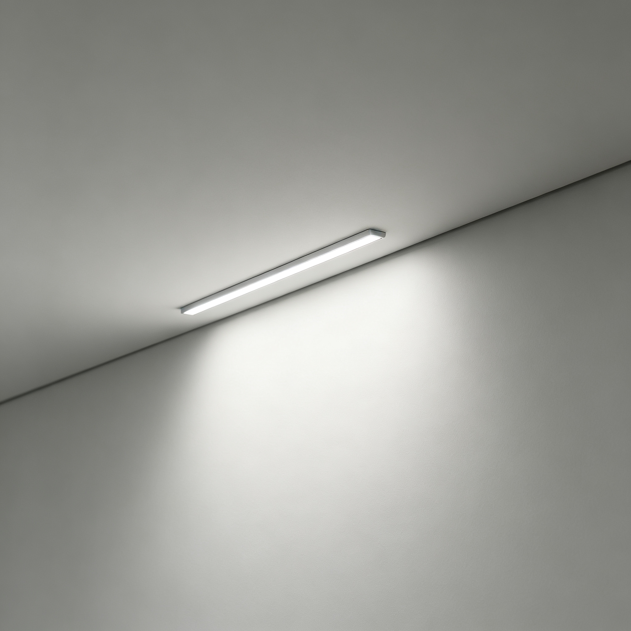 Surface mounted linear LED light at wall ceiling corner