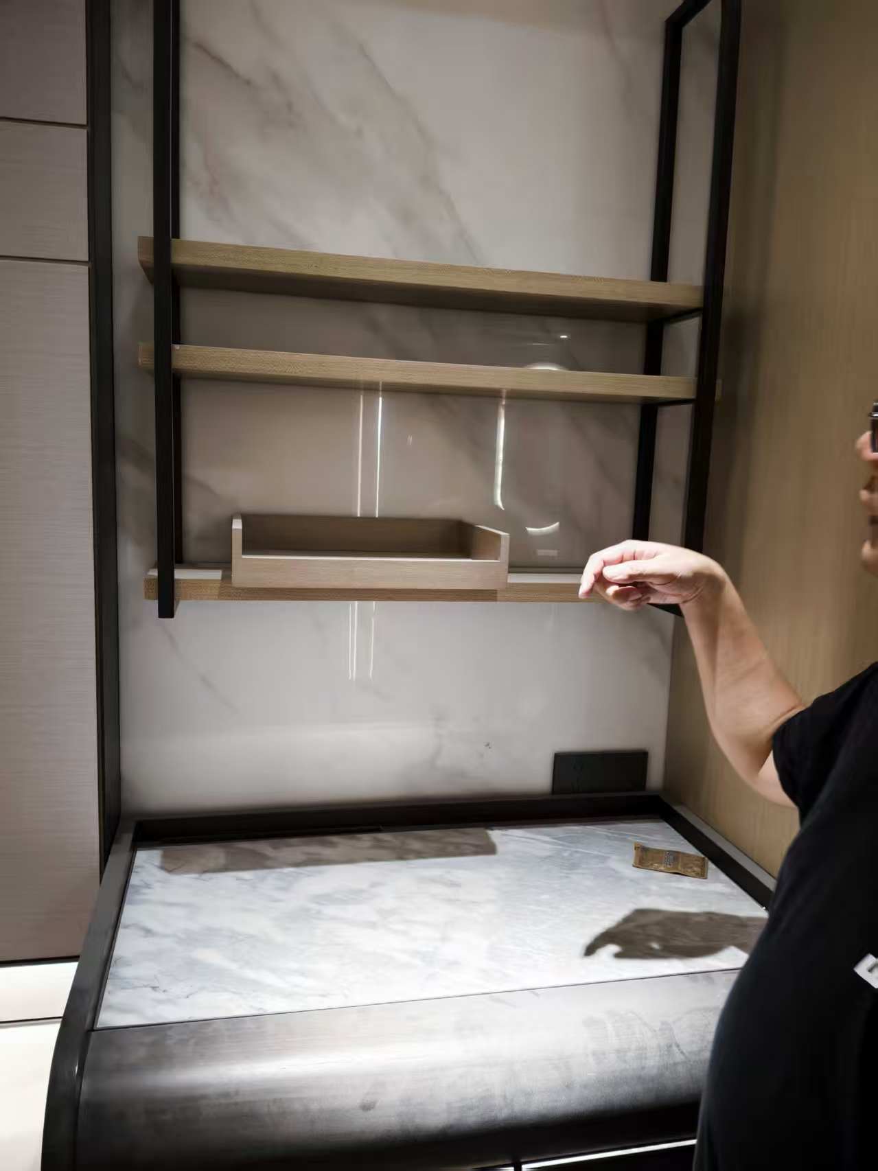Custom shelving cabinet with concealed LED strip lighting