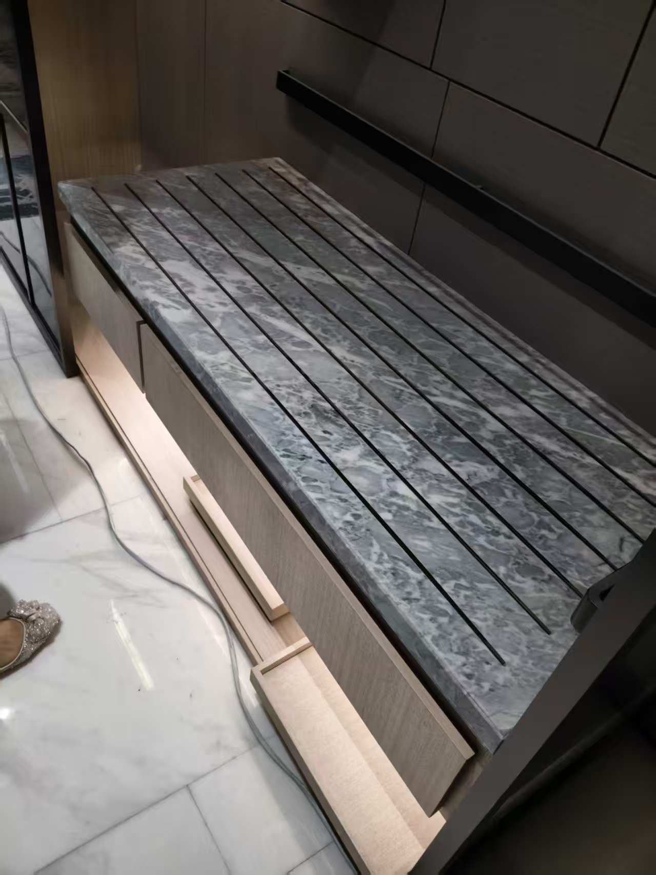 Stone countertop with linear LED light slot